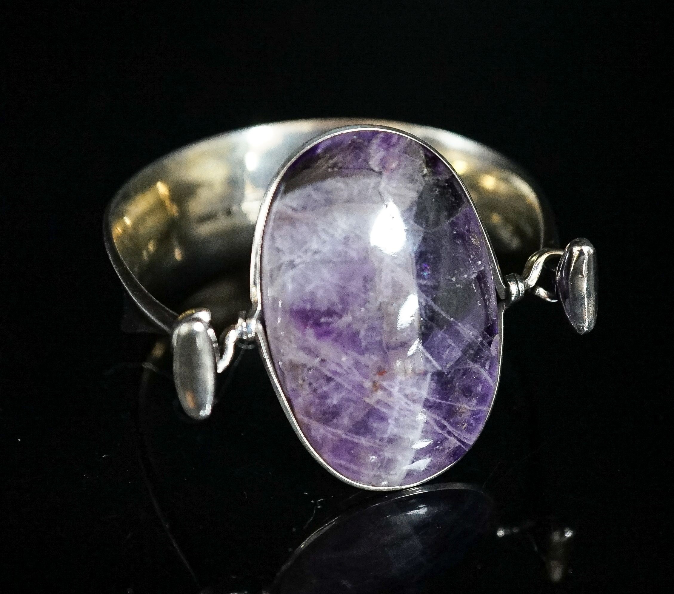 A Vivianna Torun for Georg Jensen sterling and amethyst quartz set openwork bangle, no 203, stone length approx. 43mm.